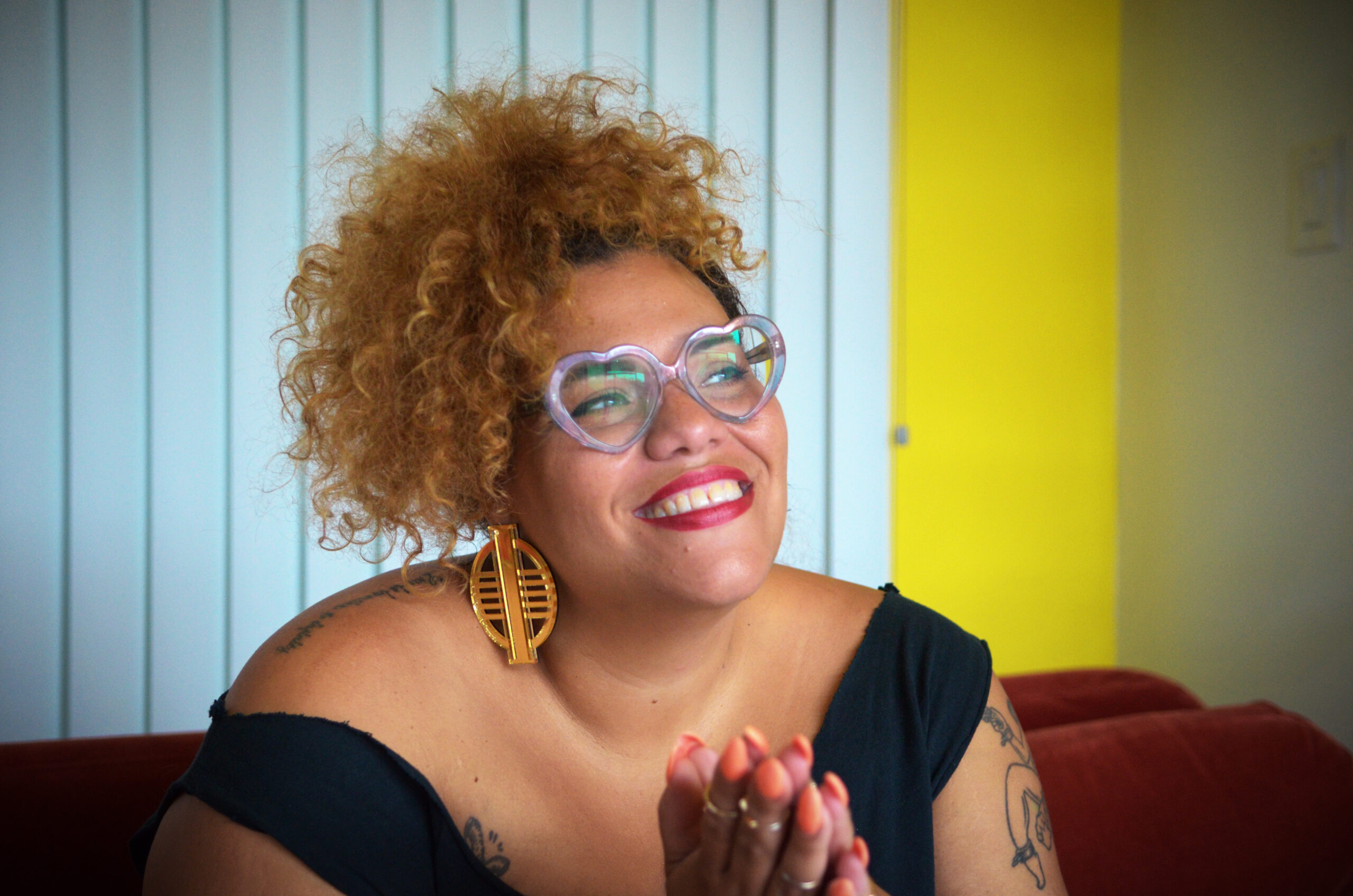 Bianca is a fat, light-skinned, disabled, queer AfraLatina